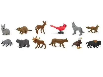 Collection of miniature animal figurines representing various North American wildlife species.