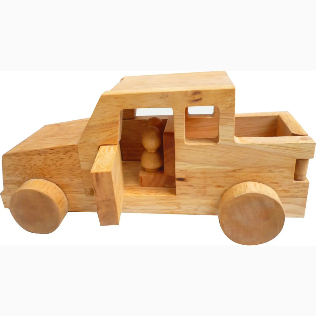 Wooden toy pickup truck.